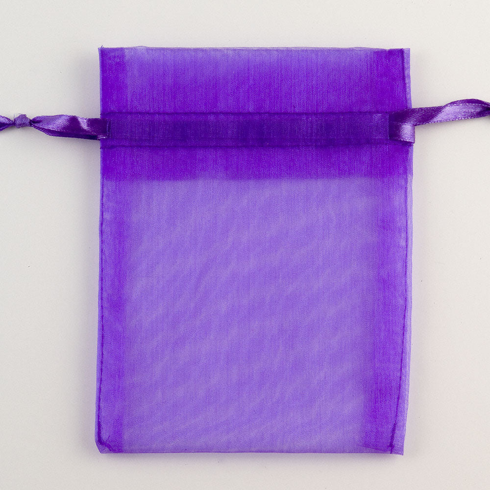Purple organza favour bag measuring 10 x 12.5cm