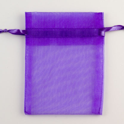 Purple organza favour bag measuring 10 x 12.5cm