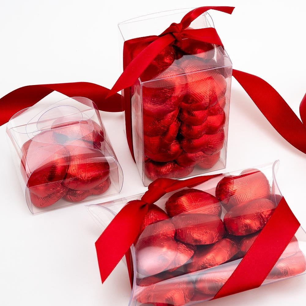 Red chocolate heart wedding favours displayed in a gift box
