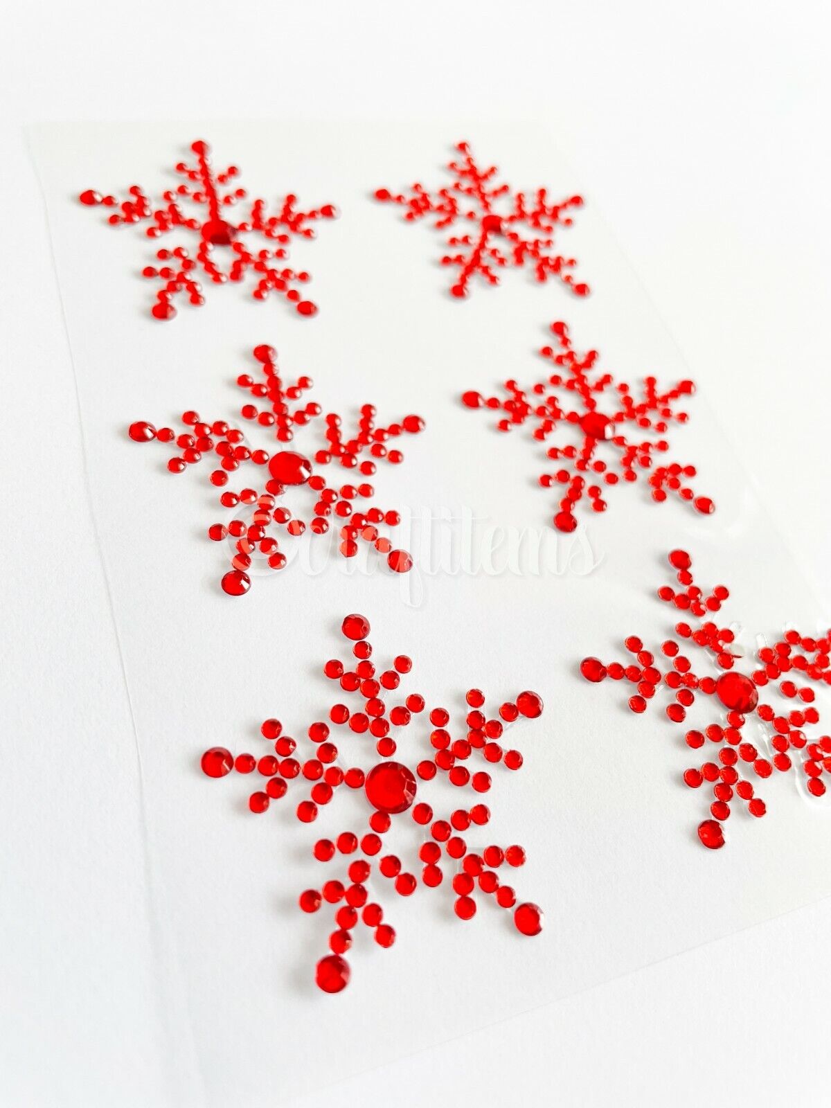 Red Christmas snowflake stickers made from rhinestones