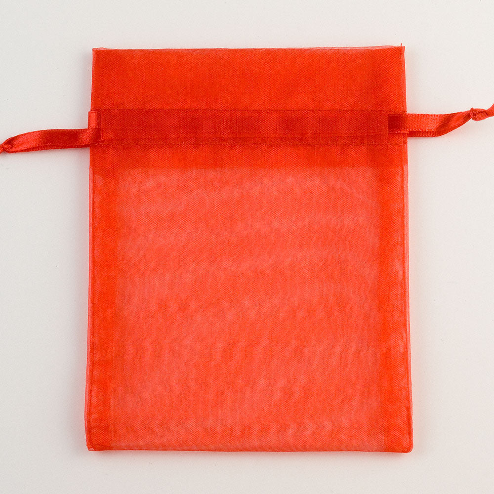 Red organza favour bag measuring 10 x 12.5cm