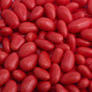 Close-up of red sugared almonds wedding favour sweets