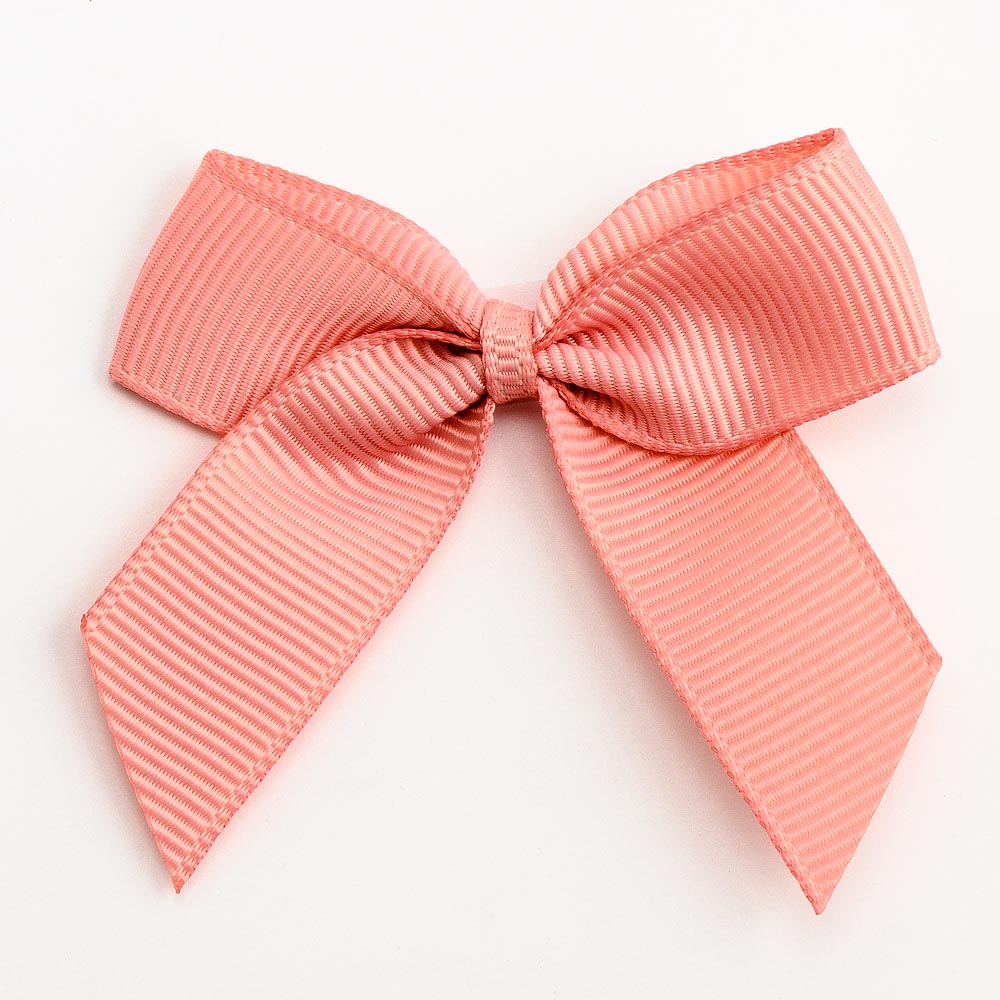 Rose Gold 5cm self-adhesive grosgrain ribbon bow on a white background