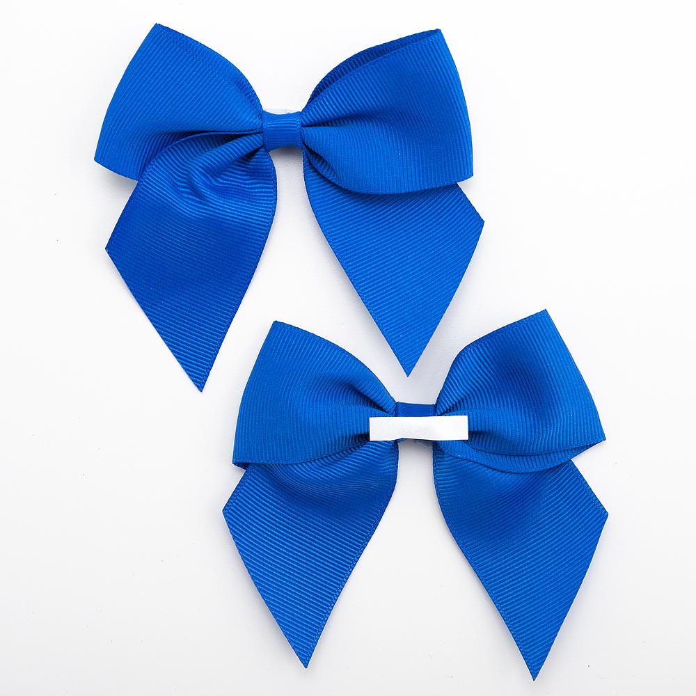 Front and back of royal blue 10cm grosgrain bow showing the self-adhesive strip