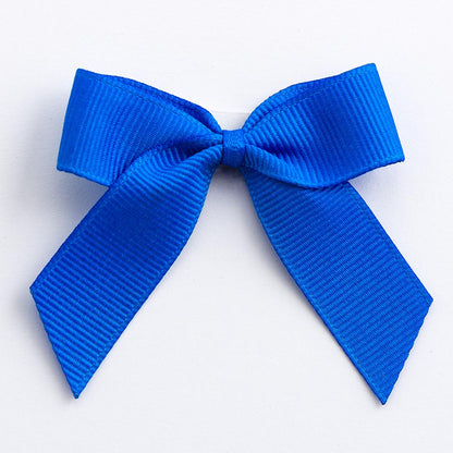 Royal Blue 5cm self-adhesive grosgrain ribbon bow on a white background
