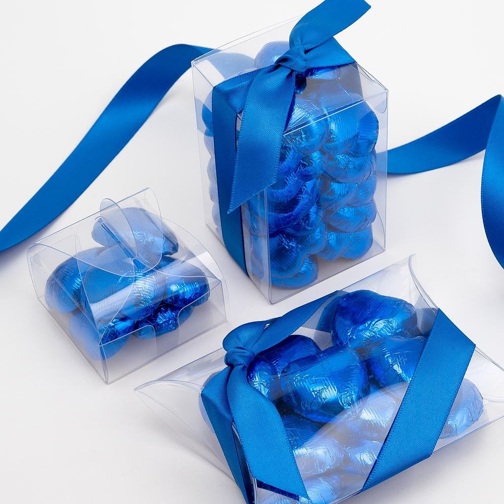 Royal blue chocolate heart wedding favours displayed in a gift box