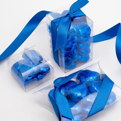 Royal blue chocolate heart wedding favours displayed in a gift box