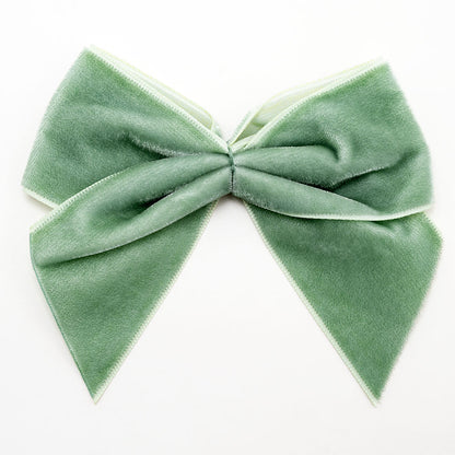 Sage Green 10cm large self-adhesive velvet ribbon bow on a white background