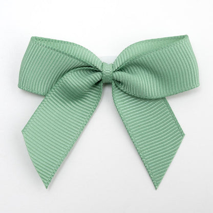 Sage Green 5cm self-adhesive grosgrain ribbon bow on a white background