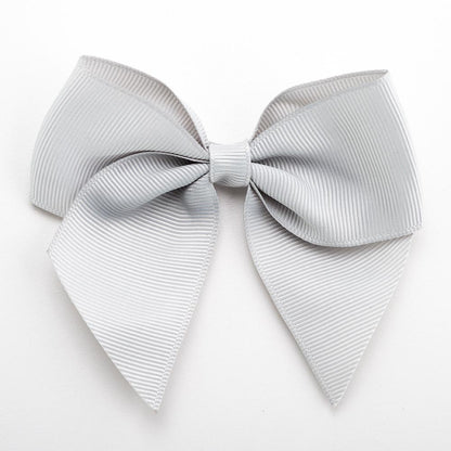 Silver 10cm self-adhesive grosgrain ribbon bow on a white background