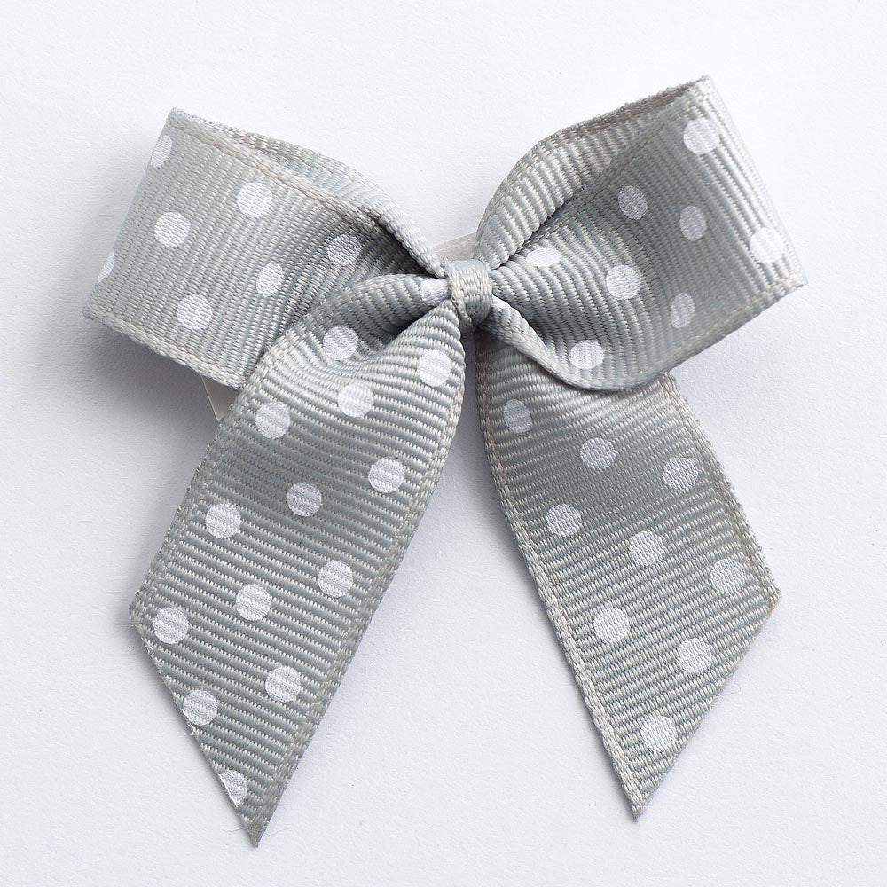 Silver 5cm polka dot grosgrain ribbon bow on a white background