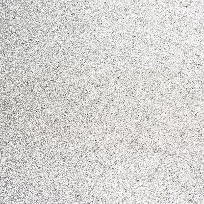 Silver A4 non-shed glitter card with a fine textured sparkle finish for luxury wedding stationery