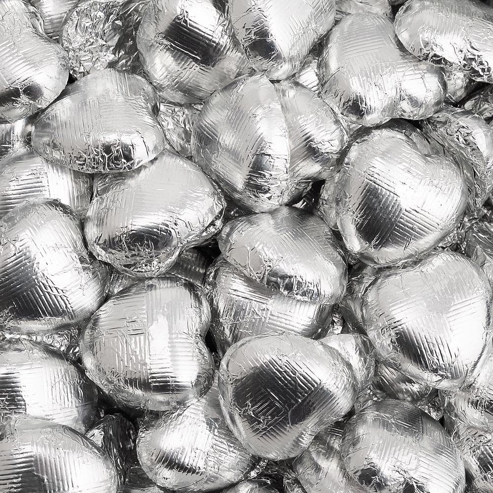 Silver foil heart chocolates for wedding favours and table settings
