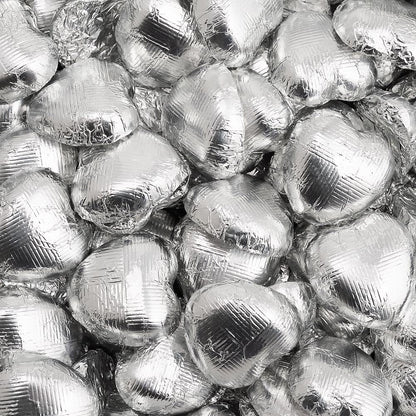 Silver foil heart chocolates for wedding favours and table settings