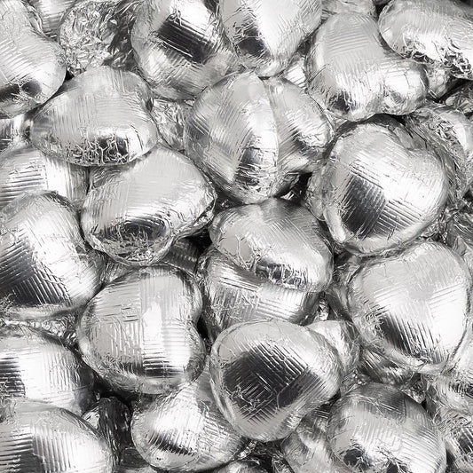 Silver foil heart chocolates for wedding favours and table settings