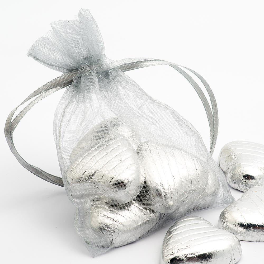 Silver organza wedding favour bag filled with sweets