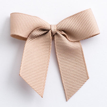 Taupe 5cm self-adhesive grosgrain ribbon bow on a white background