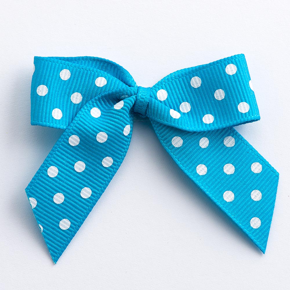 Turquoise 5cm polka dot grosgrain ribbon bow on a white background