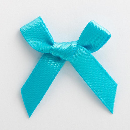 Turquoise mini satin ribbon bow made from 6mm ribbon, approximately 3cm wide