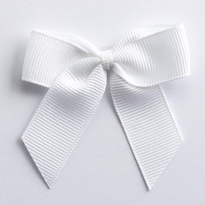 White 5cm self-adhesive grosgrain ribbon bow on a white background