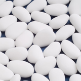 White sugar almonds for traditional wedding favours and elegant table settings