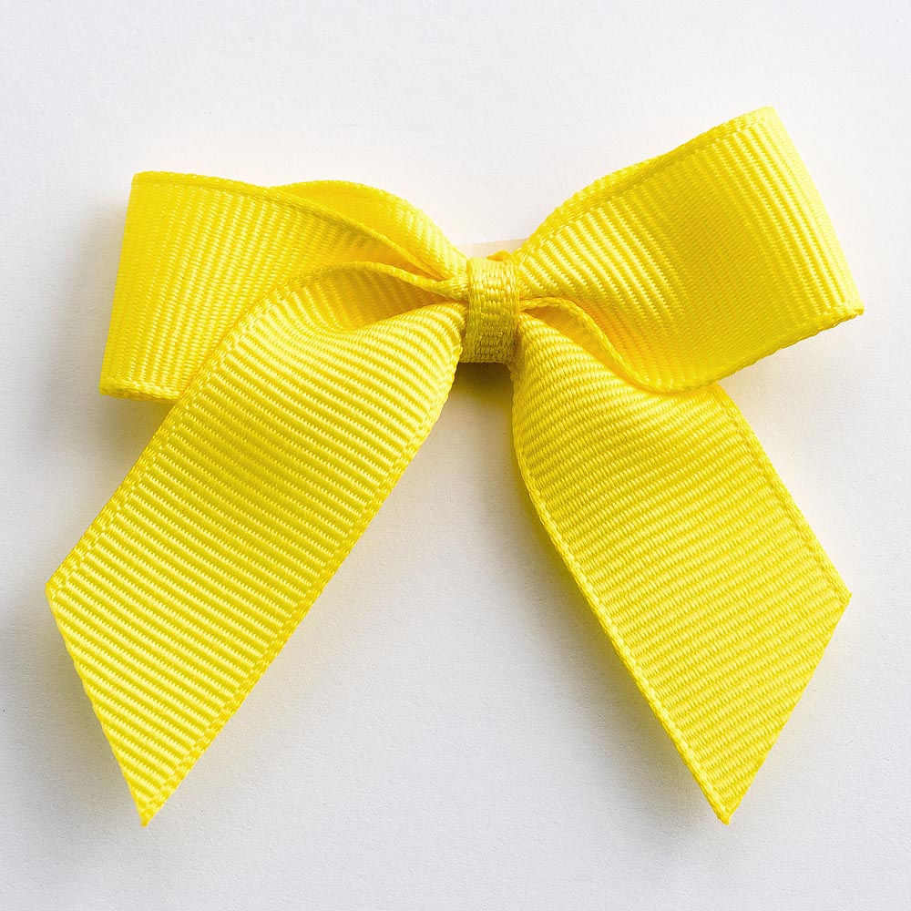 Yellow 5cm self-adhesive grosgrain ribbon bow on a white background