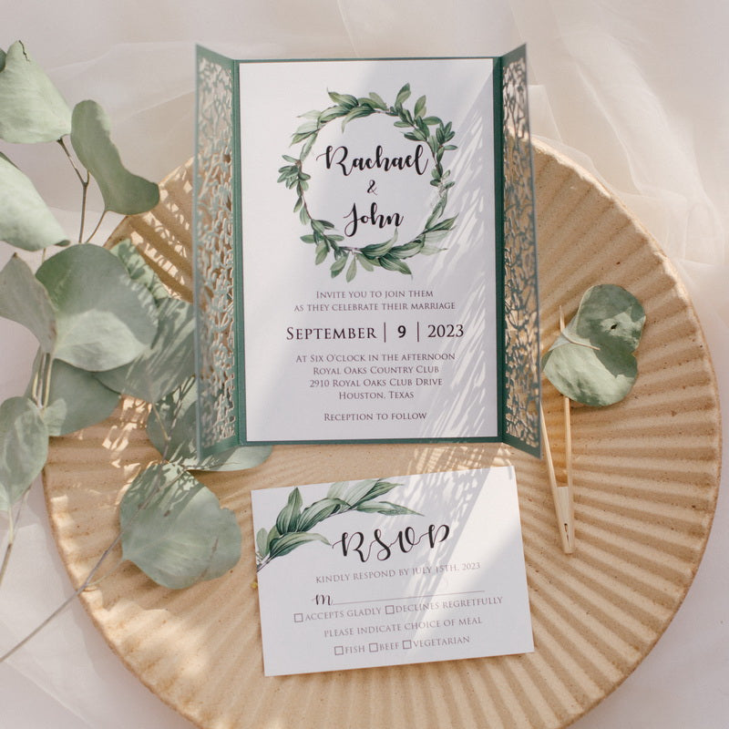 Botanical themes green wedding invitation open showing wedding invitation detail