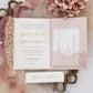 tri fold laser cut poeckt wedding invitation in blush pink with belly band