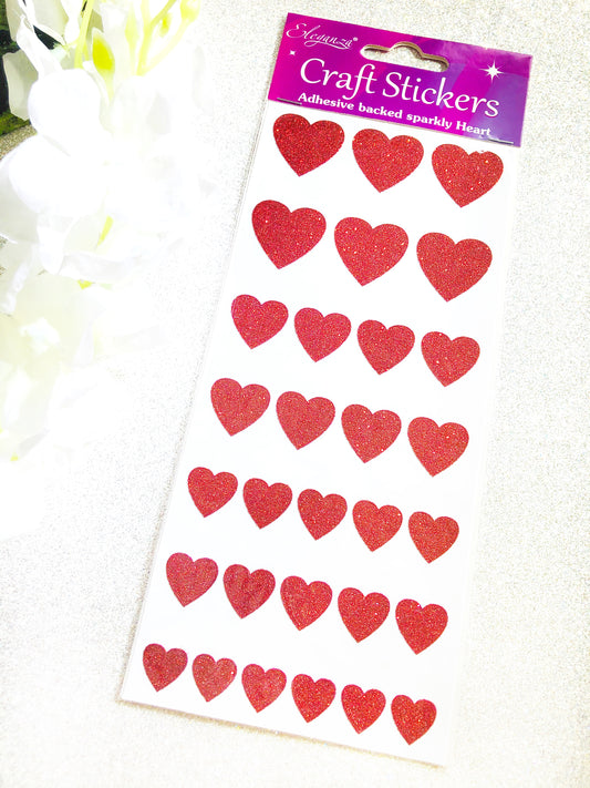 Small red glitter love heart craft stickers for handmade wedding invitations, greetings cards and scrapbooks