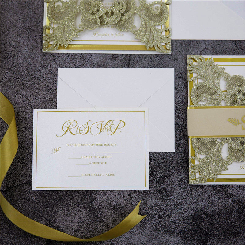Close up pf gold printed rsvp for wedding invitation
