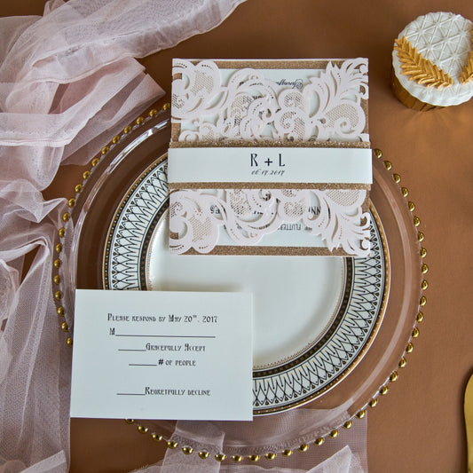 Blush pink wedding invitation with rose gold glitter and belly band