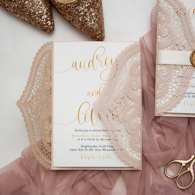 open wedding invite with lace detail card
