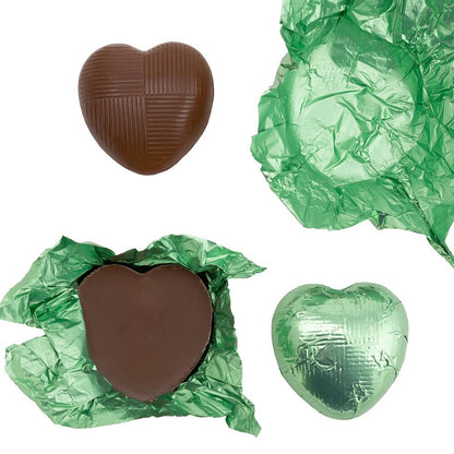 Green foil heart chocolates for wedding favours and table settings