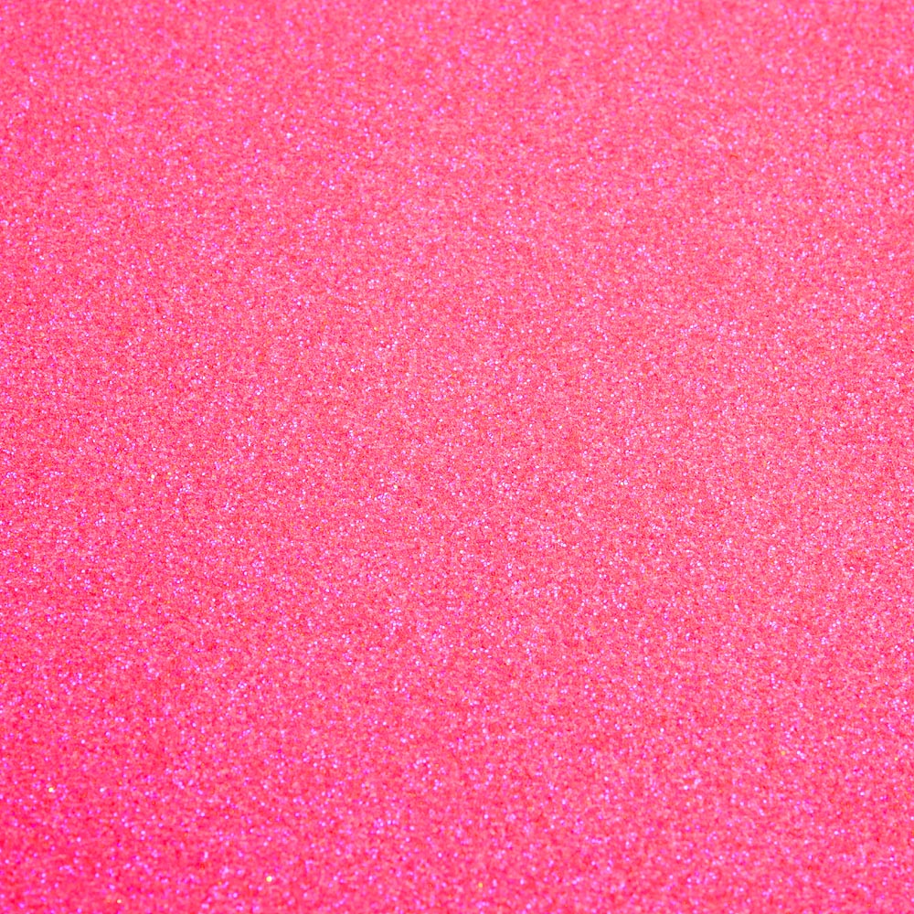Bright Neon Pink A4 non-shed glitter card with a fine textured sparkle finish for luxury wedding stationery