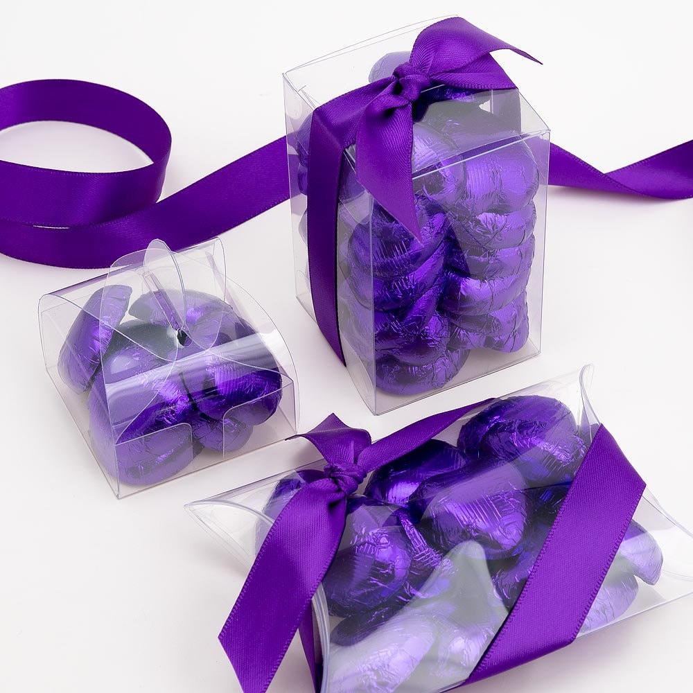 Purple chocolate heart wedding favours displayed in a gift box