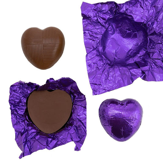 Purple foil heart chocolates for wedding favours and table settings