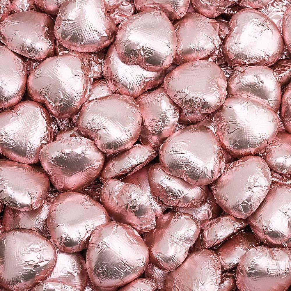 Rose gold foil heart chocolates for wedding favours and table settings