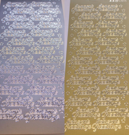 Gold and silver sheets of seasons greetings Christmas poeel off stickers