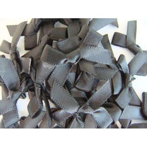 Small grey satin ribbon bows made from 7mm ribbon for wedding stationery and crafts