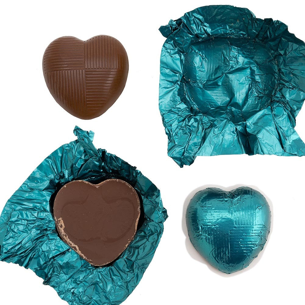 Teal chocolate heart wedding favours displayed in a gift box