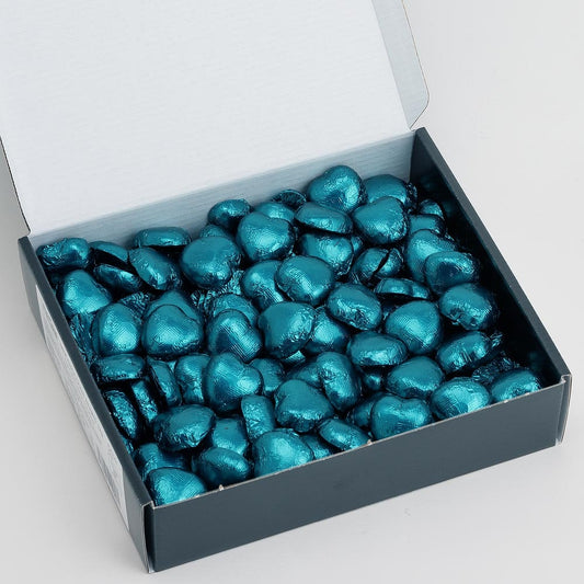 Teal foil heart chocolates for wedding favours and table settings
